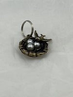 Antique Bronze Bird Nest with Mama Bird and Acrylic Eggs Pendant