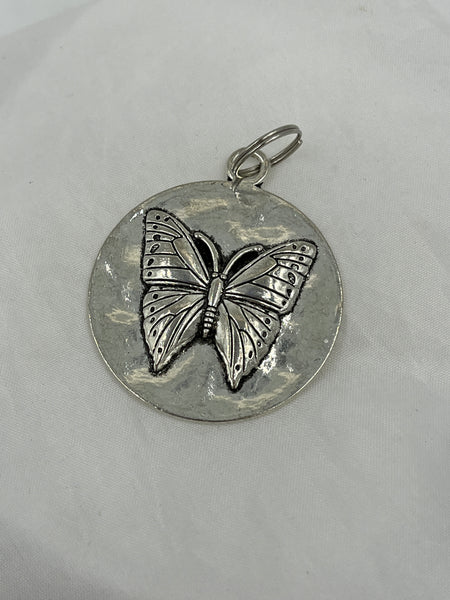 Silver Tone Metal Disk Pendant with Butterfly Design