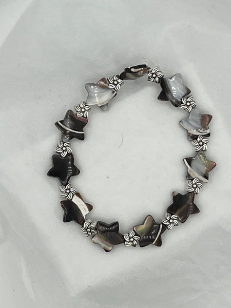 Black Mother of Pearl Carved Star and Silvertone Flowers Beaded Stretch Bracelet
