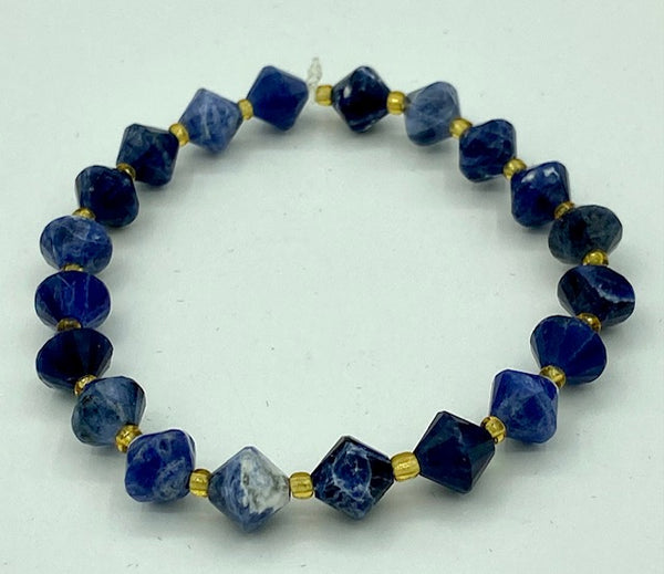 Natural Sodalite Gemstone Bicone And Gold Accent Beaded Stretch Bracelet