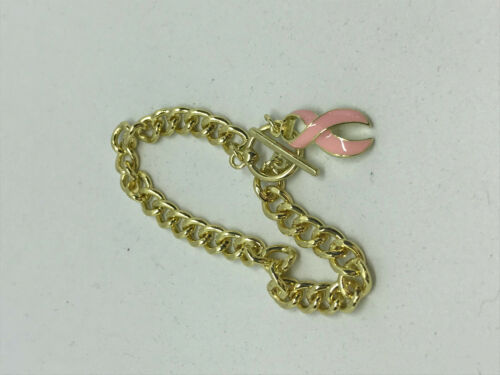 gold tone bracelet with ribbon charm