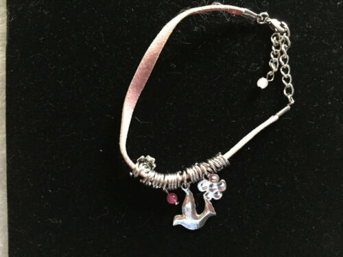 pink suede cord adjustable bracelet with silvertone bird and flower charms