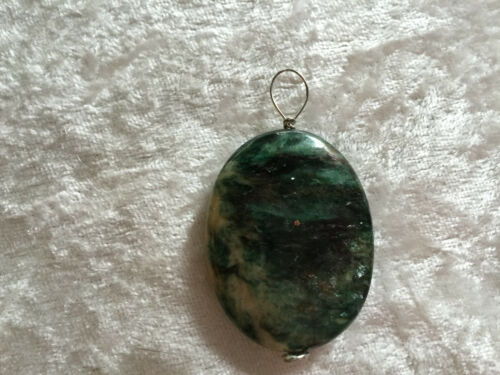 natural raw emerald gemstone puffy oval pendant