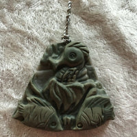 natural ribbon jasper gemstone carved fish and seahorse pendant