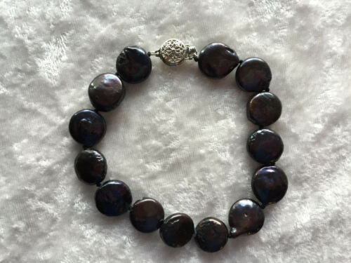 lovely black mother of pearl disk beaded bracelet