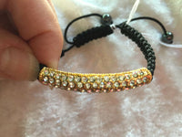 gold tone and sparkly cz adjustable macrame bracelet