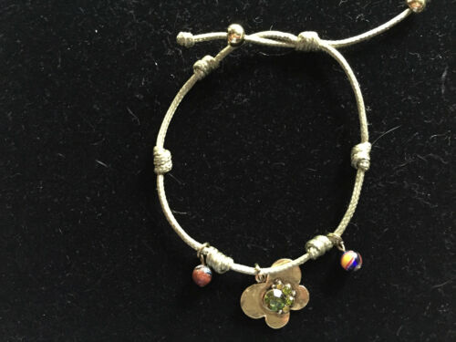 green adjustable bracelet with gold cz butterfly charm