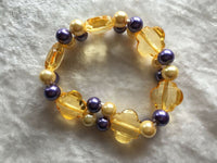 gold and purple flowers acrylic beaded stretch bracelet