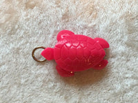 red acrylic turtle pendant
