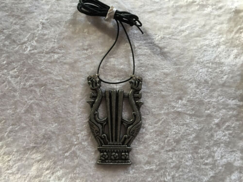 silvertone lyre with fish pendant on adjustable cord necklace