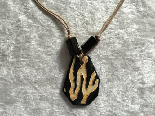 natural buffalo horn zebra print pendant on tan cord necklace