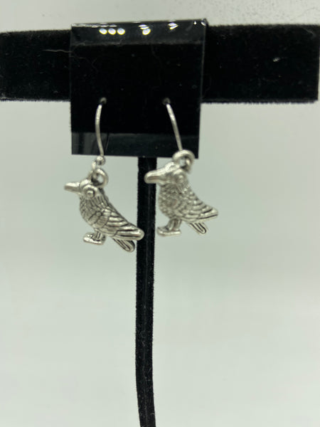 silvertone raven charm dangle earrings