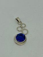 Natural Sapphire Gemstone Round in Sterling Silver Curls Pendant