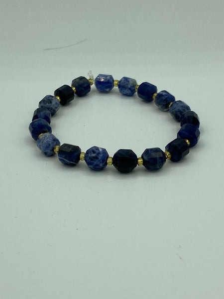 Natural Sodalite Gemstone Faceted Barrels and Gold AccentBeaded Stretch Bracelet